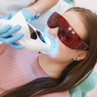 Can I brush my teeth after laser whitening?